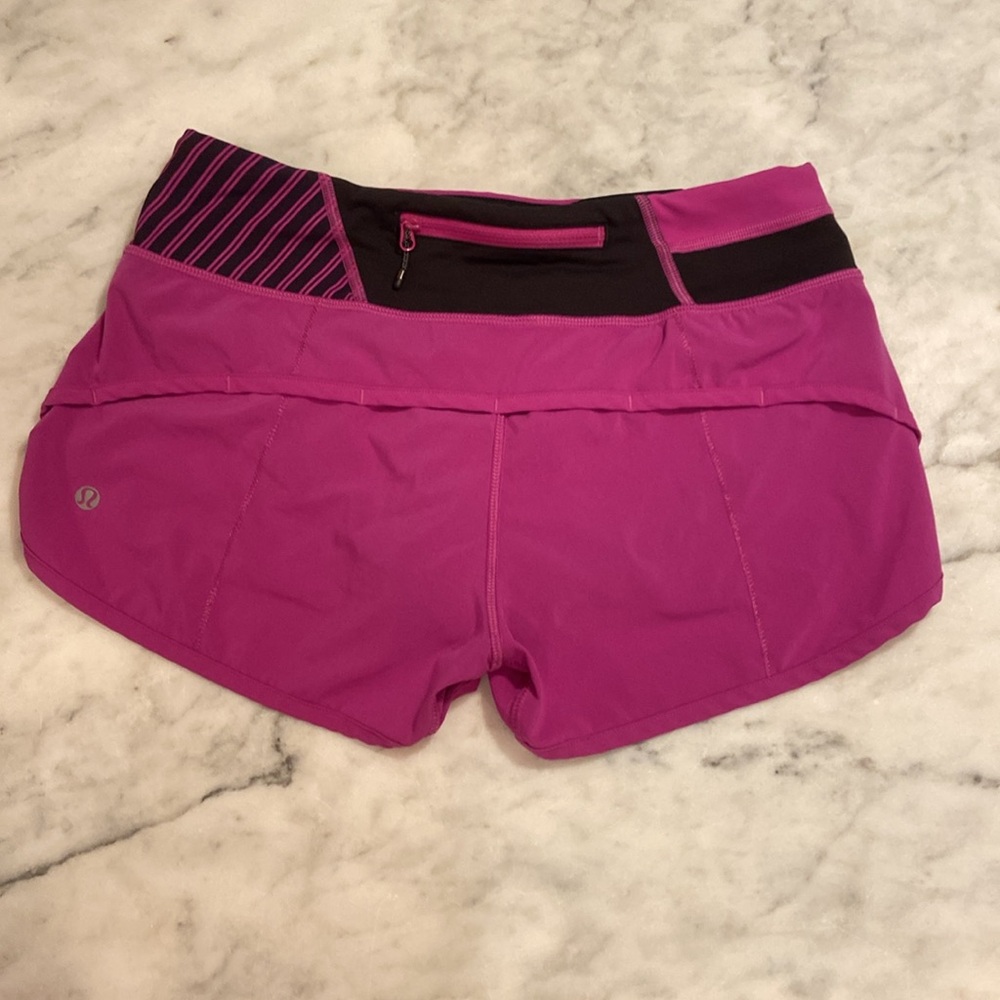 lululemon athletica Women's Magenta Athletic Shorts with Black Waistband - Picture 2 of 5
